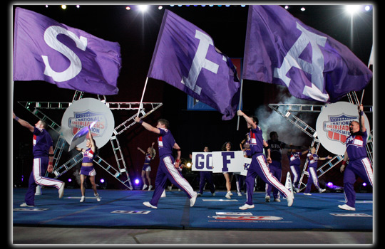 SFA cheerleaders and flags